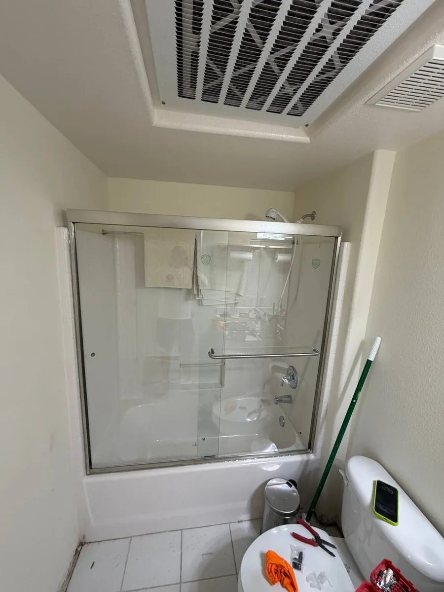 Shower door installation in a Henderson, NV bathroom by LvH Vegas Handyman Co
